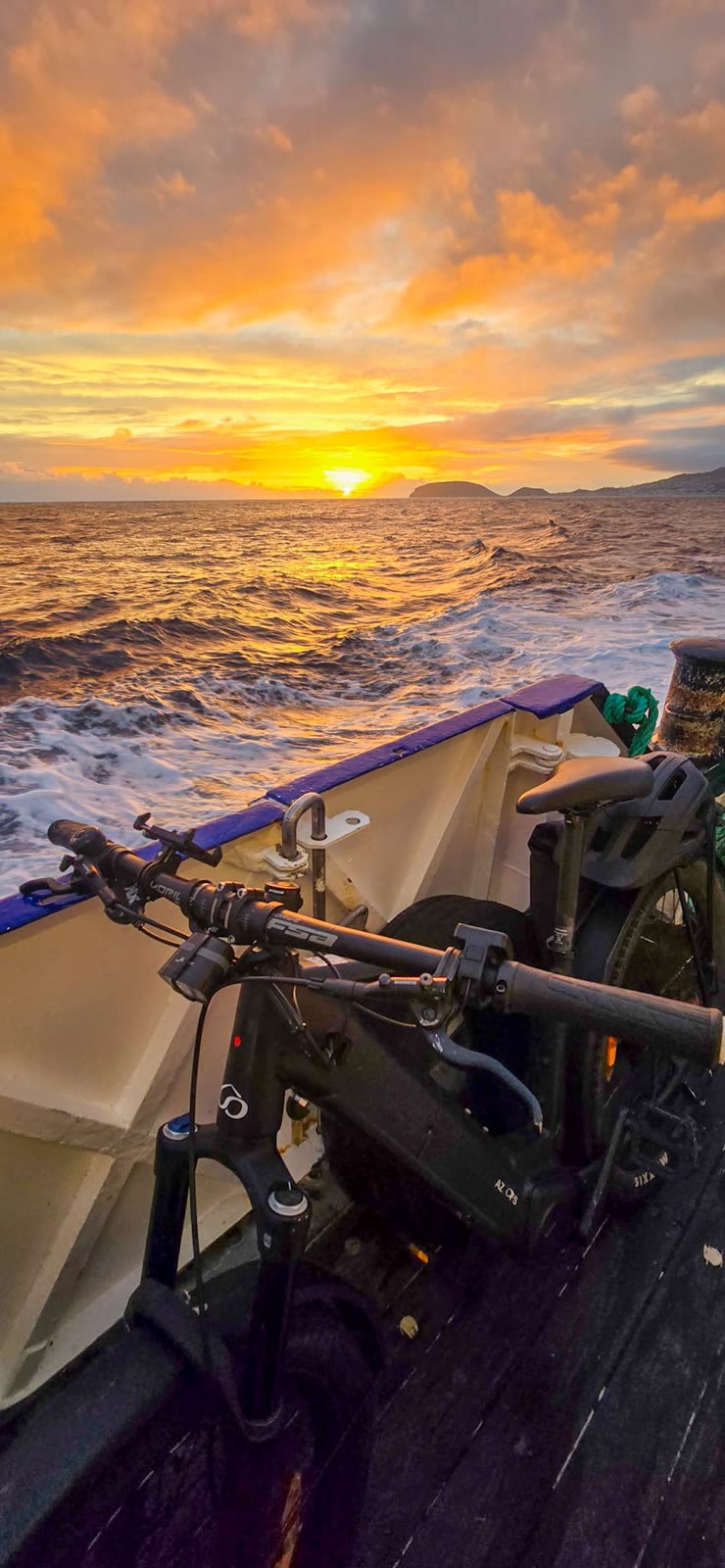 A BEEQ on the deck of the boat at sunset, crossing back from Faial to Pico