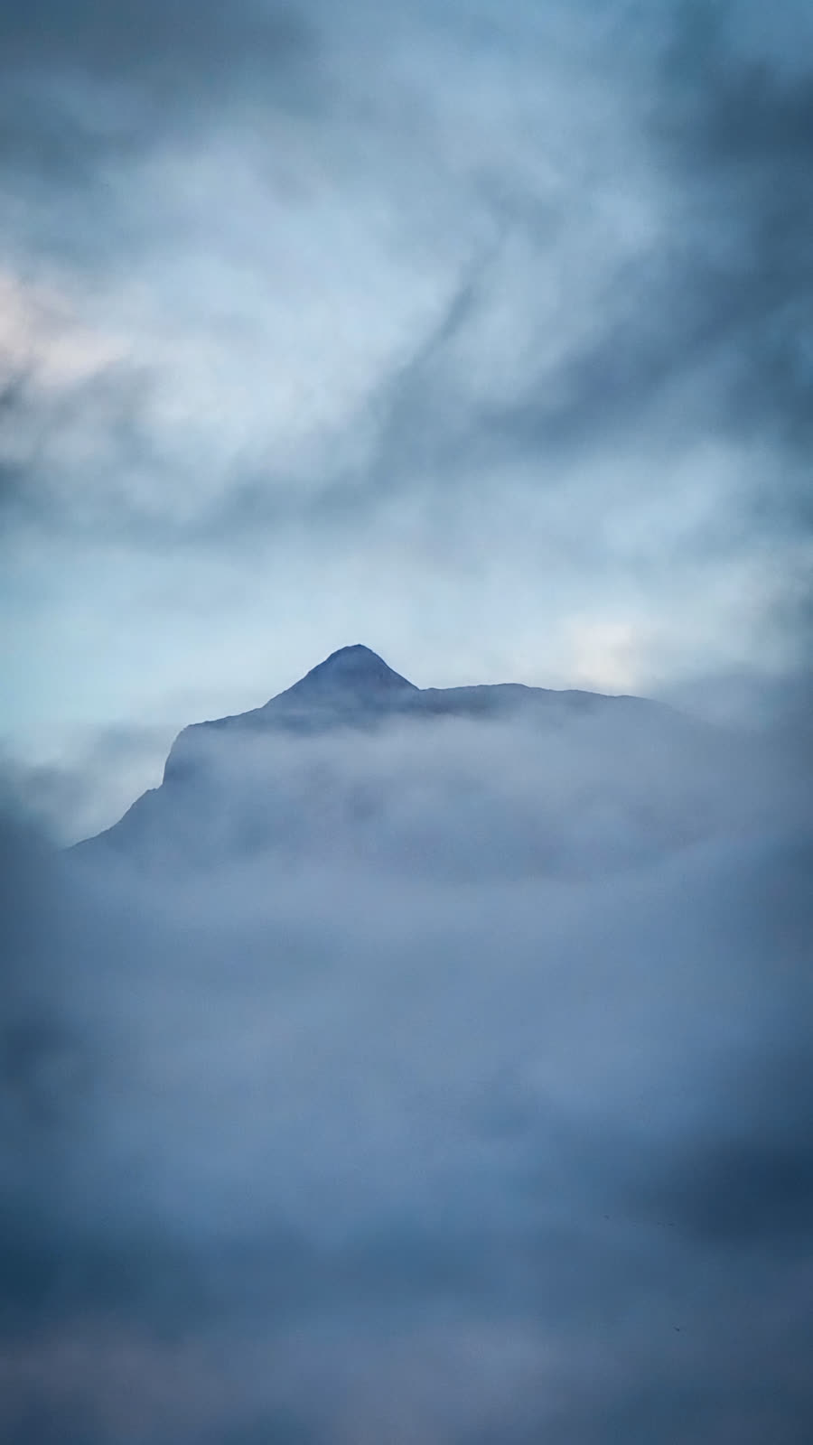 The summit of Pico rising out of a sea of clouds