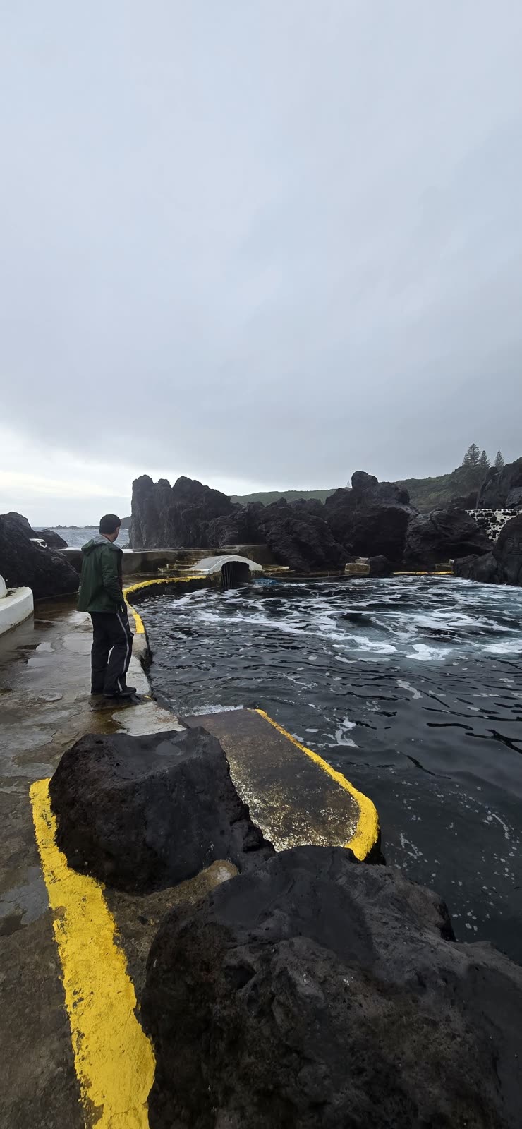 Varadouro natural pools on Faial, among black lava rocks